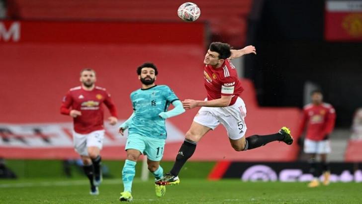 Harry Maguire and Mo Salah